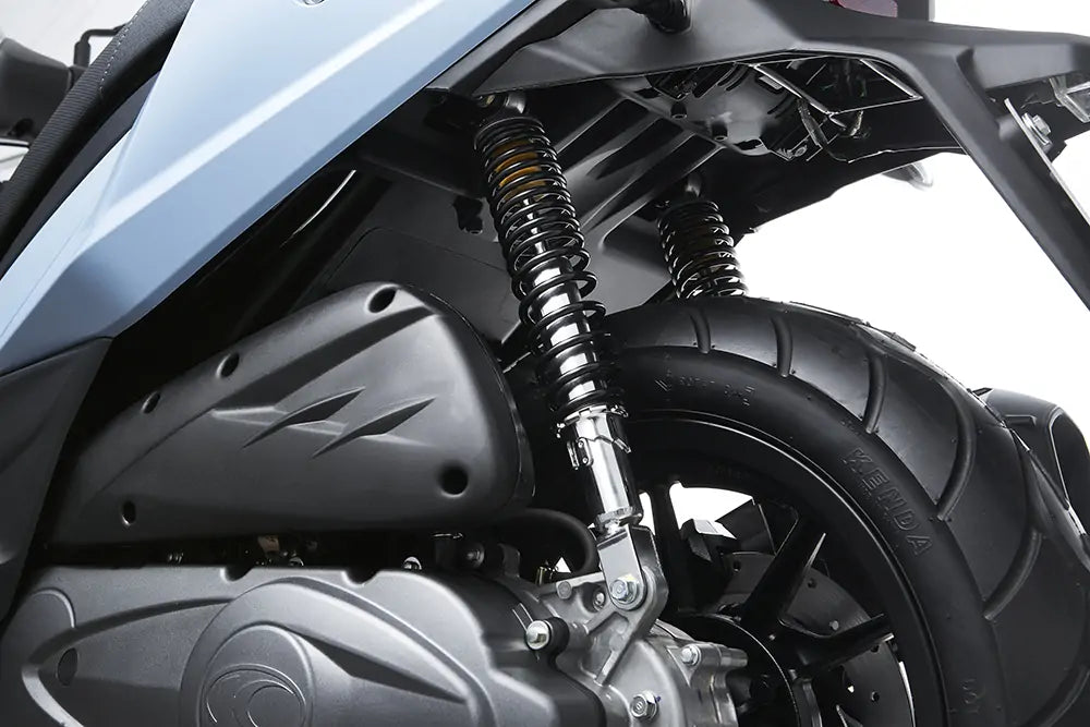 Rear suspension and wheel of a Kymco motorbike for comfort in Aegina