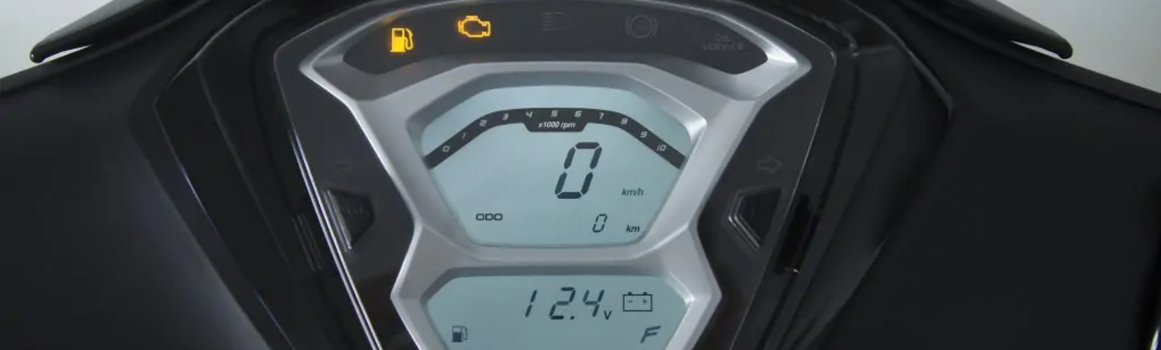 Digital dashboard of a Kymco Agility S 125i ABS motorbike in Aegina